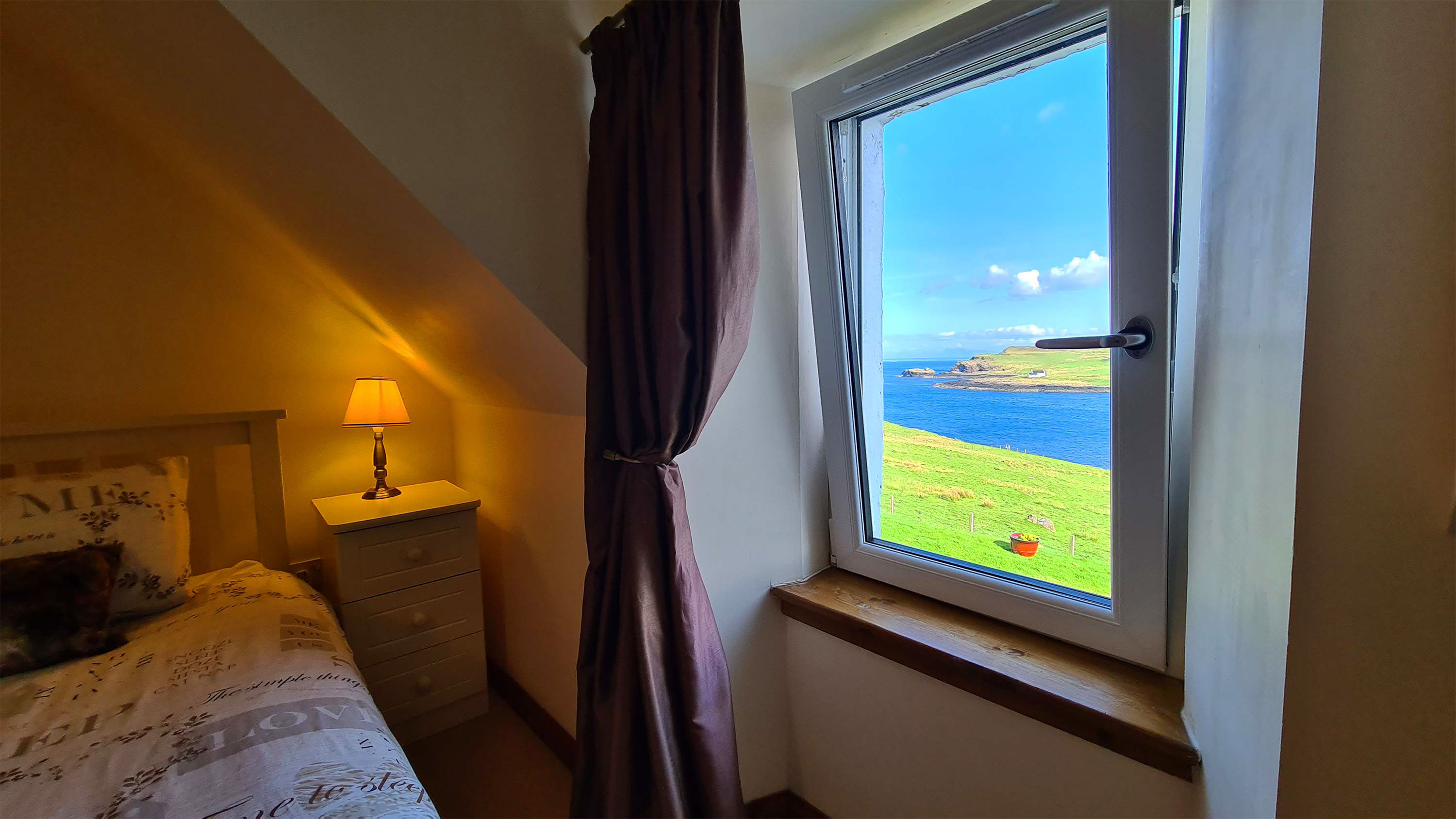 Aird Cottage Self Catering Accommodation looks out on to sea views of the North of the Isle of Skye