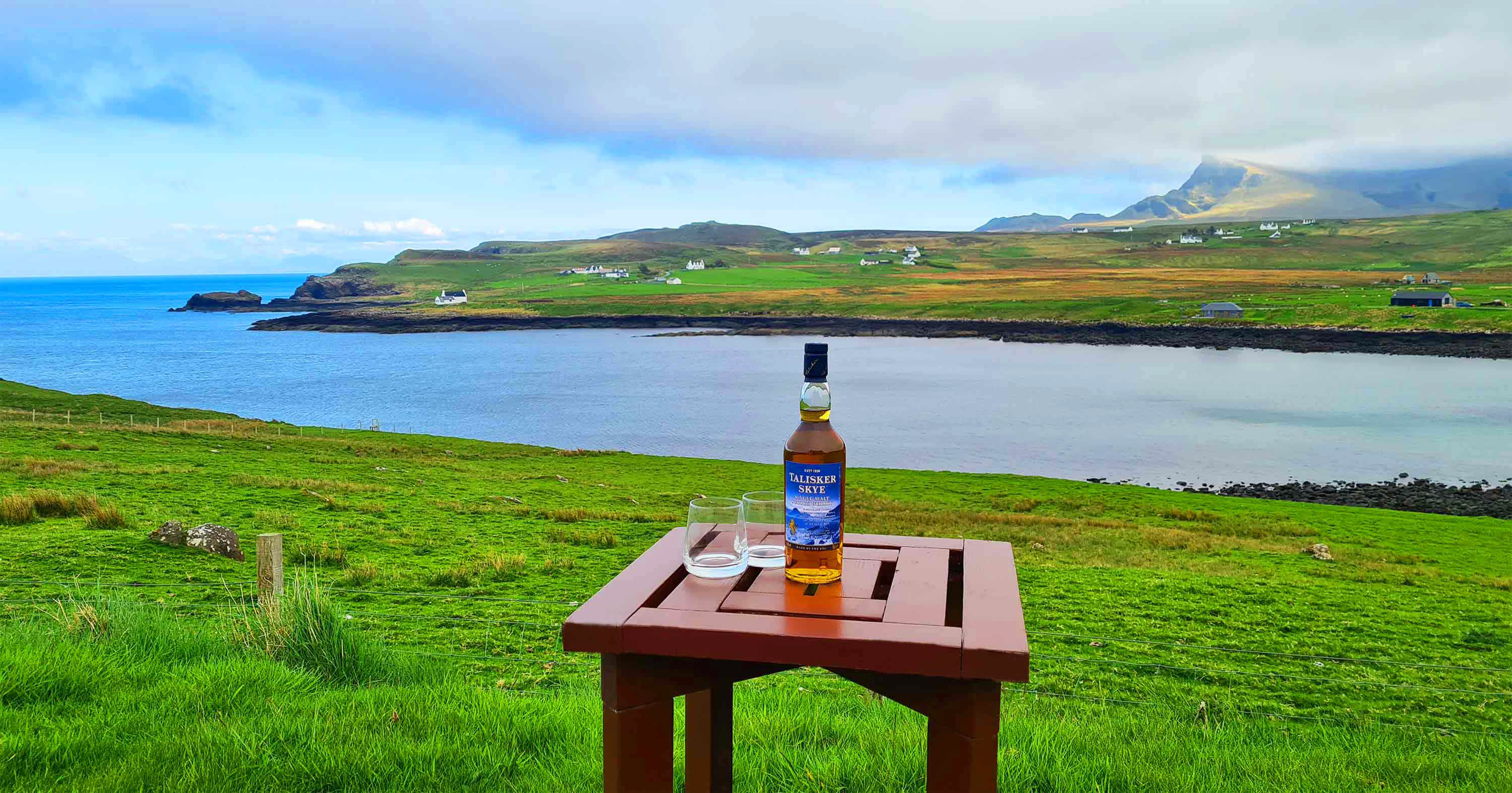 Enjoy an evening drink at the Aird Cottage outside seating area and enjoy sea and mountain views